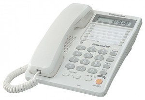 Телефон Panasonic KX-TS2365RUW ЖК-дисплей с часами спикерфон укоренный набор однокнопочный набор 3 уровня громкости звонка возможность установки на стене разъем для гарнитуры 